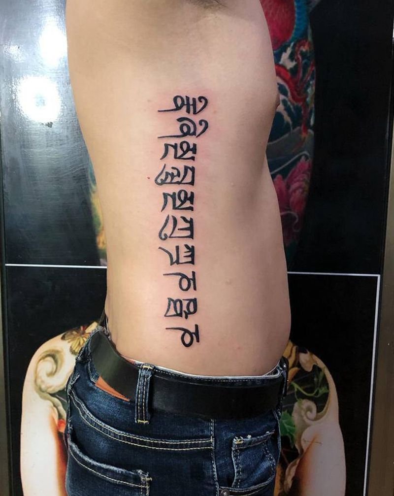 梵文纹身图片_腰部水墨纹身图案