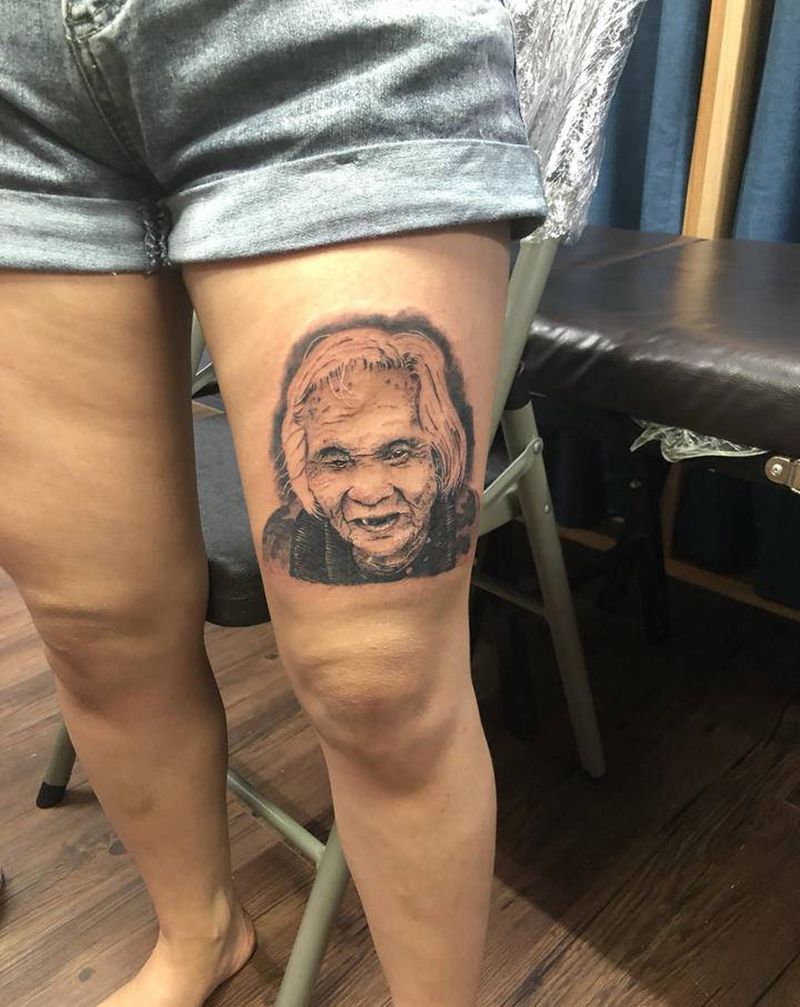 客人纪念已故亲人纹身图片_腿部欧美写实纹身图案