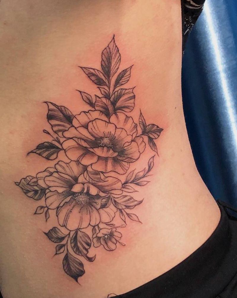 素花纹身图片_腰部点刺纹身图案