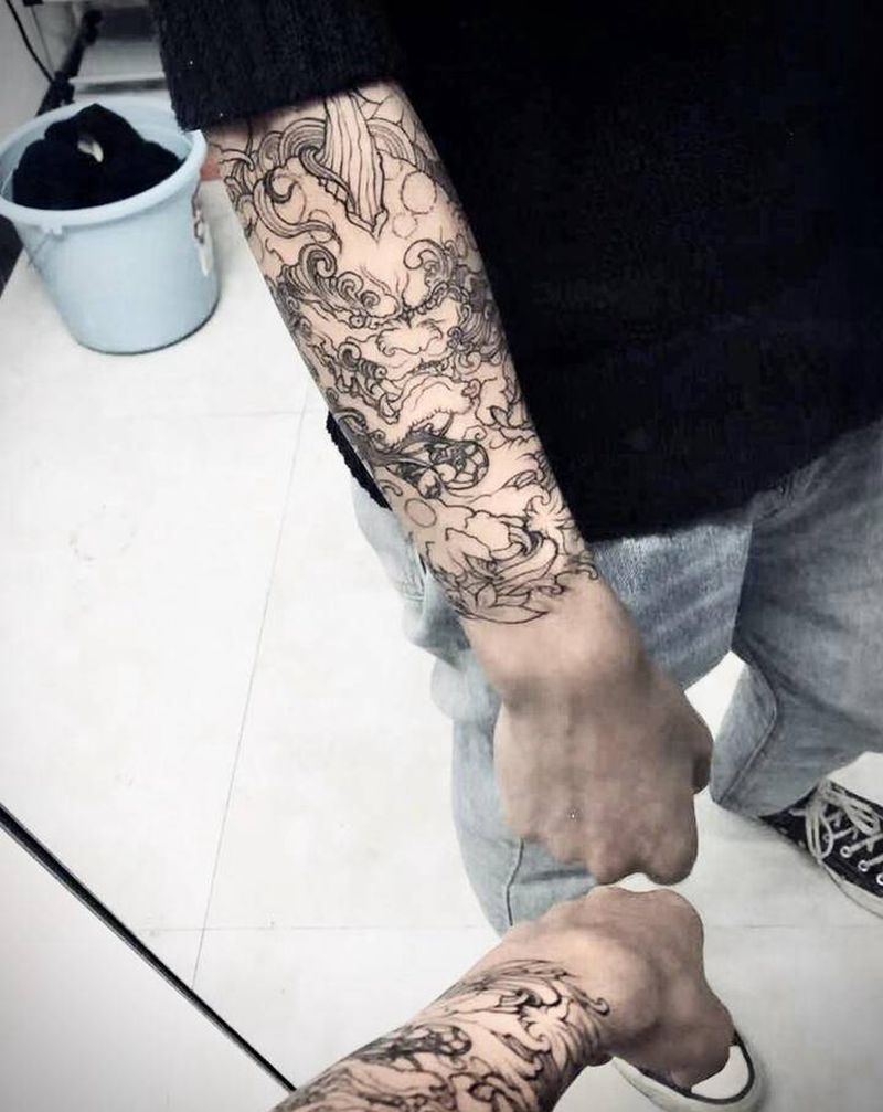 唐狮包臂线条纹身图片_手臂老传统唐狮纹身图案