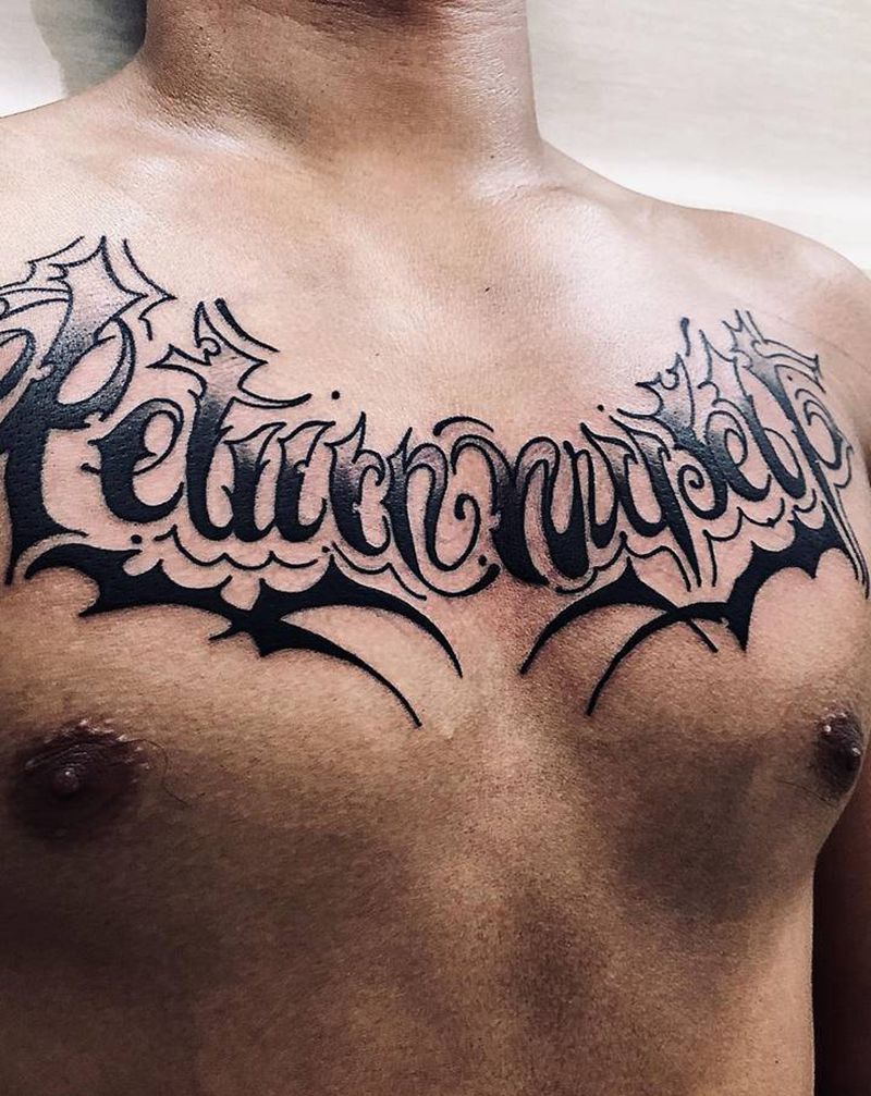 花体字纹身图片_胸部纹身图案