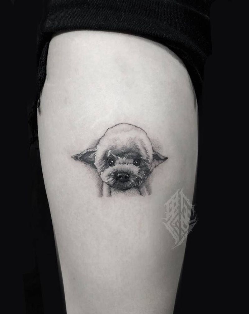 小狗纹身纹身图片_腿部欧美写实点刺纹身图案