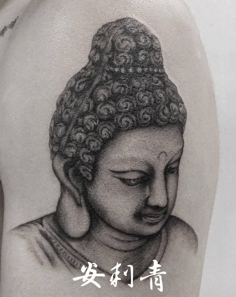 佛像纹身图片_手臂手部欧美写实点刺佛头黑灰写实纹身图案