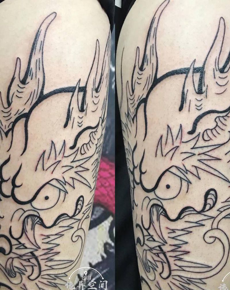 大腿龙头线条纹身图片_腿部老传统纹身图案