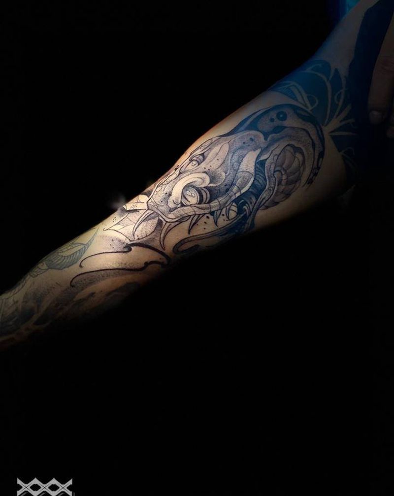 蛇头纹身图片_手臂纹身图案