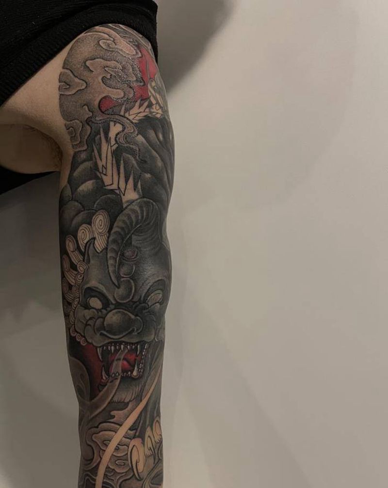 貔貅七分袖遮盖未完纹身图片_手臂新传统纹身图案