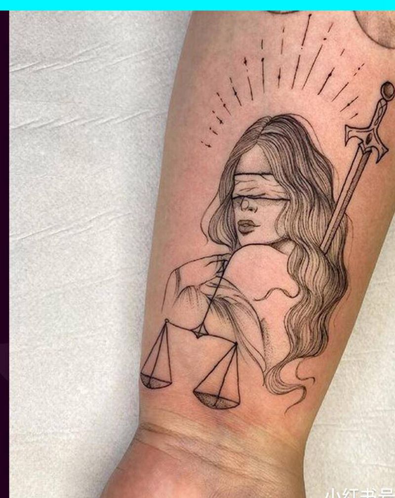 正义女神纹身图片_手臂手部点刺纹身图案