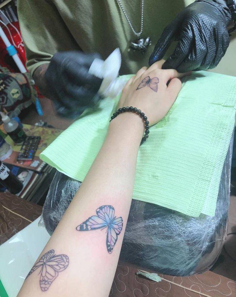 蝴蝶（遮盖疤痕）纹身图片_手臂水彩纹身图案