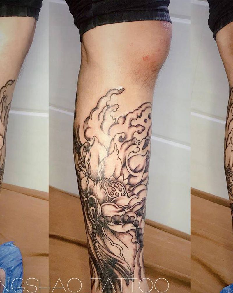 荷花+覆盖纹身图片_腿部老传统纹身图案