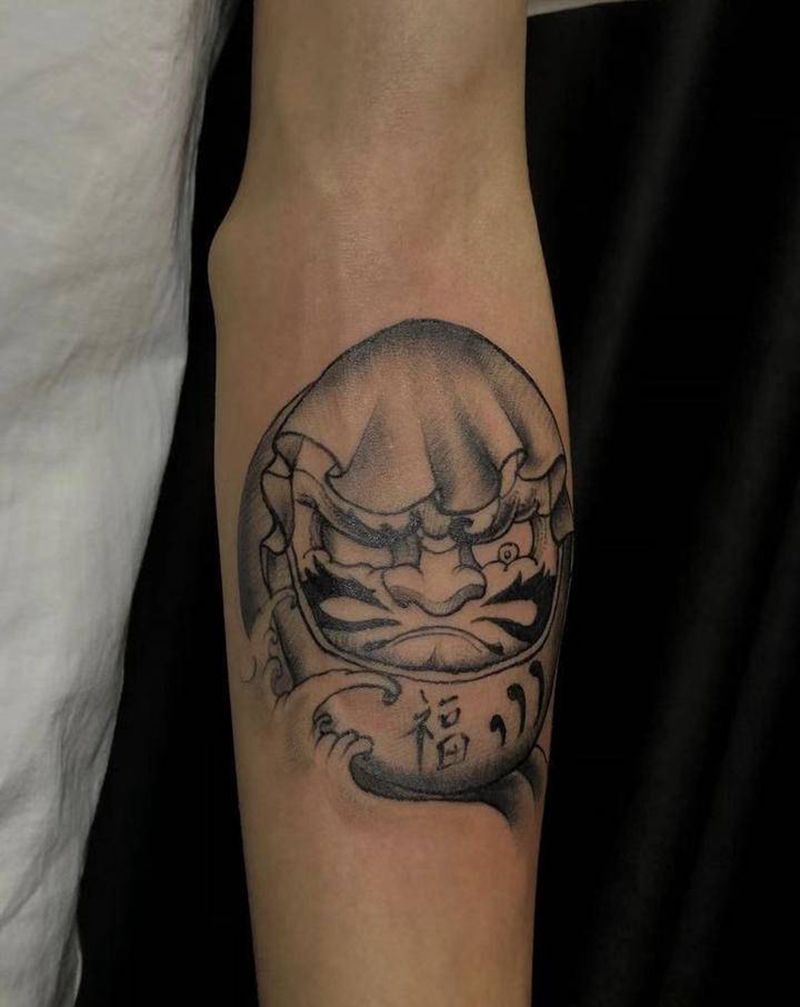达摩蛋纹身图片_手臂纹身图案