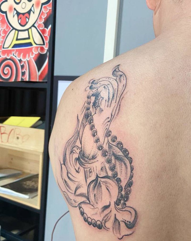 佛手纹身图片_背部纹身图案