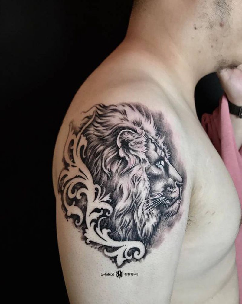 狮子纹身图片_手臂欧美写实纹身图案