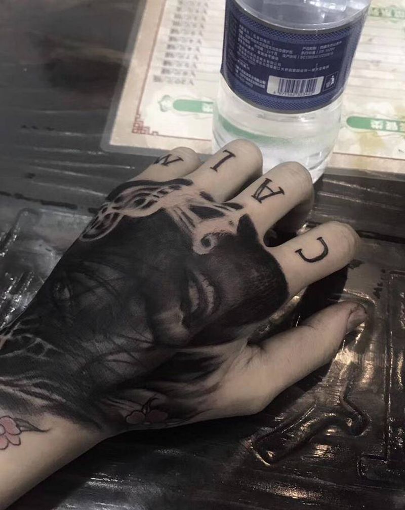 遮盖纹身图片_手部纹身图案