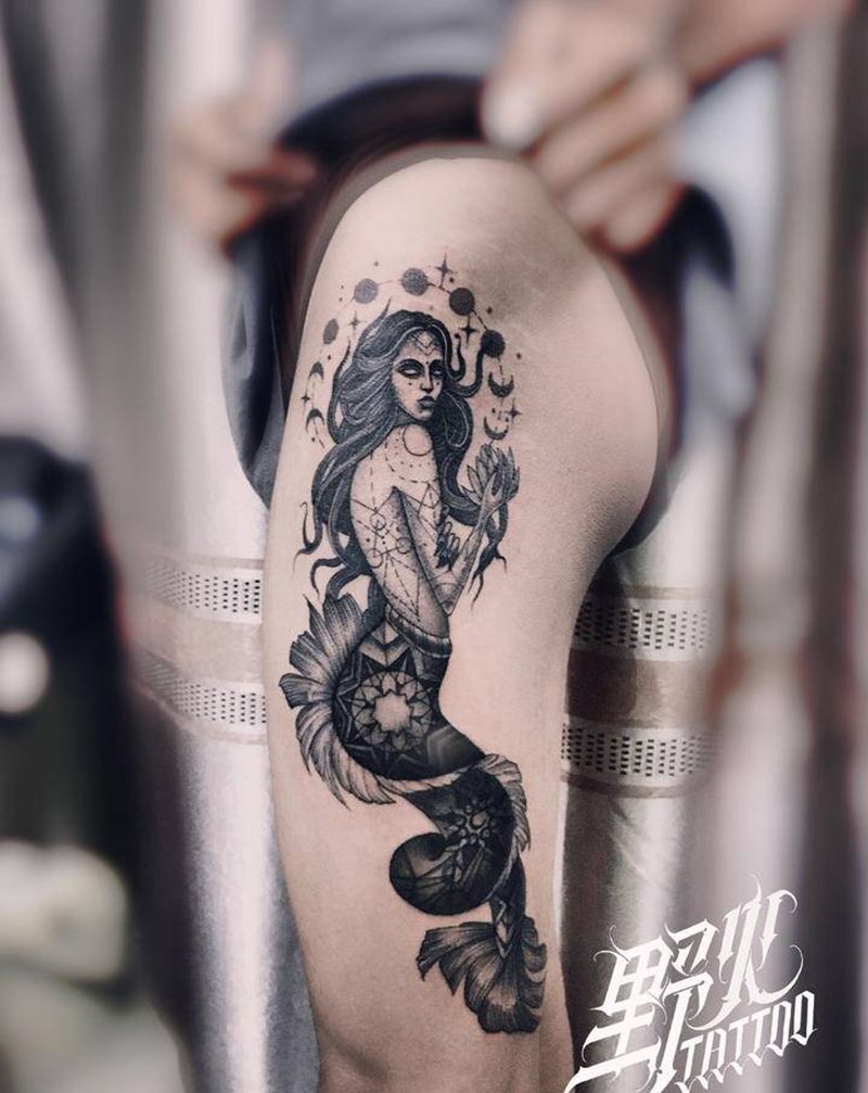 扫针 点刺 美人鱼纹身图片_腿部欧美写实美人鱼纹身图案