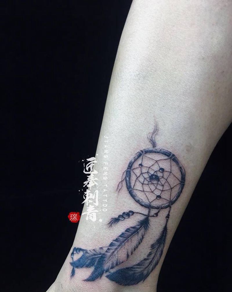 「捕梦网遮盖」纹身图片_脚部欧美写实纹身图案