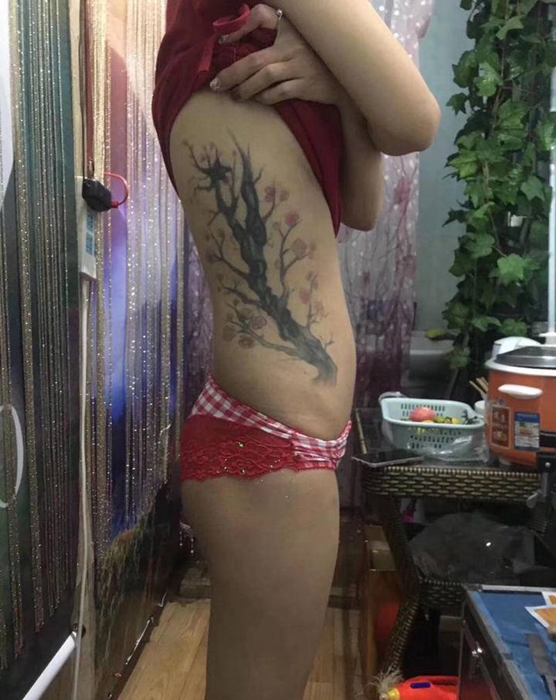 遮盖纹身图片_腰部纹身图案