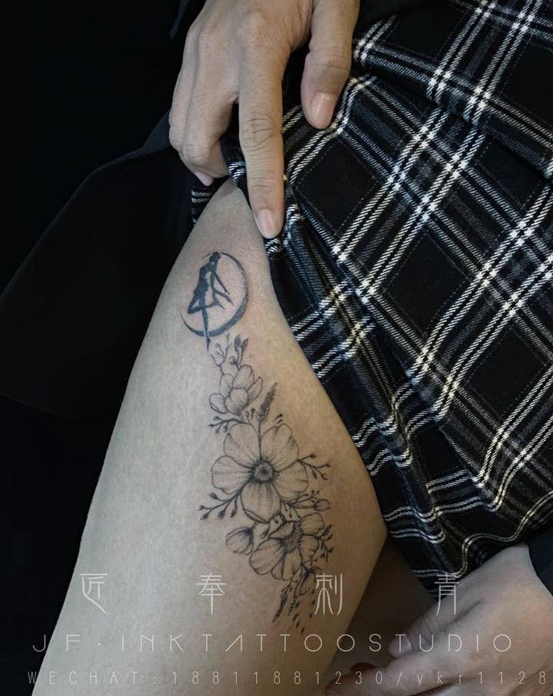 花卉纹身图片_腿部点刺纹身图案