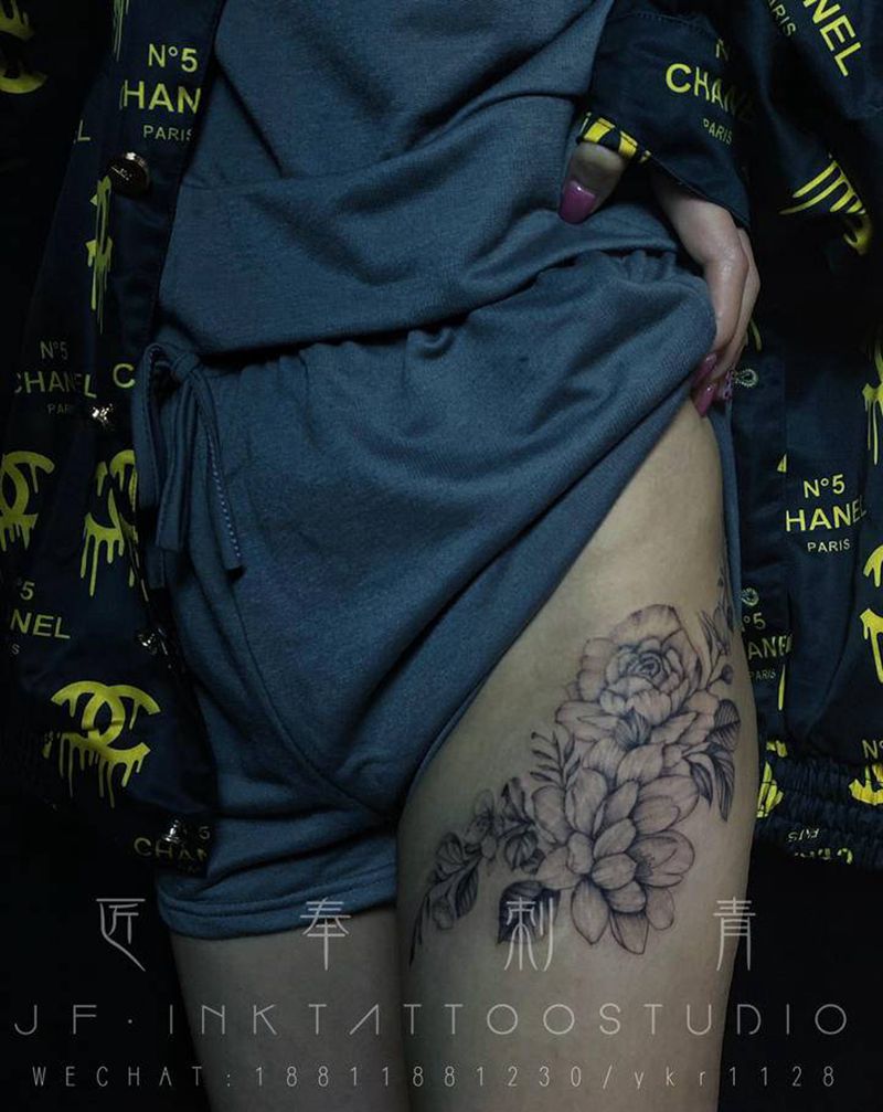 花卉纹身图片_腿部点刺纹身图案