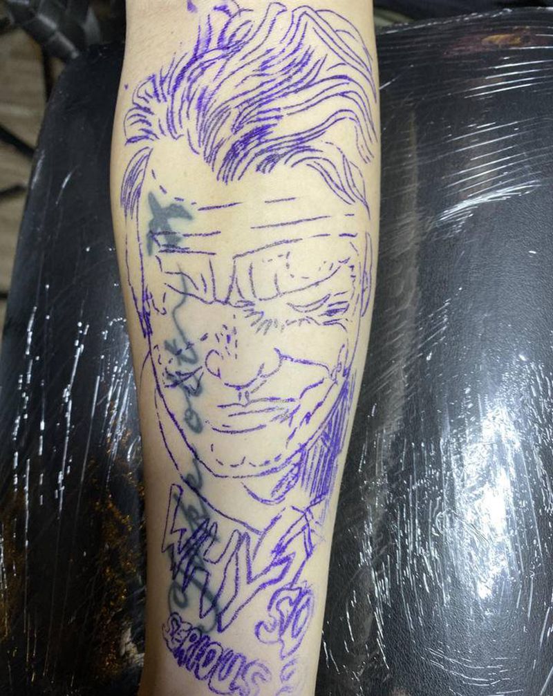 小丑遮盖纹身图片_手臂欧美写实纹身图案