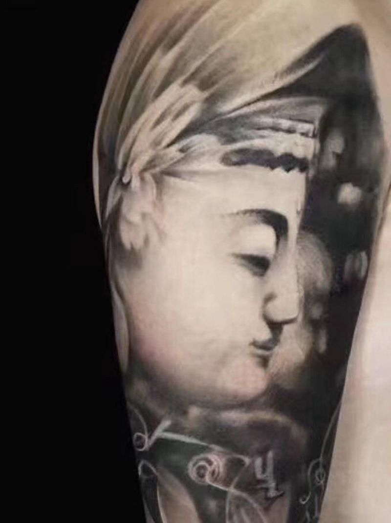 花臂一角纹身图片_手臂纹身图案