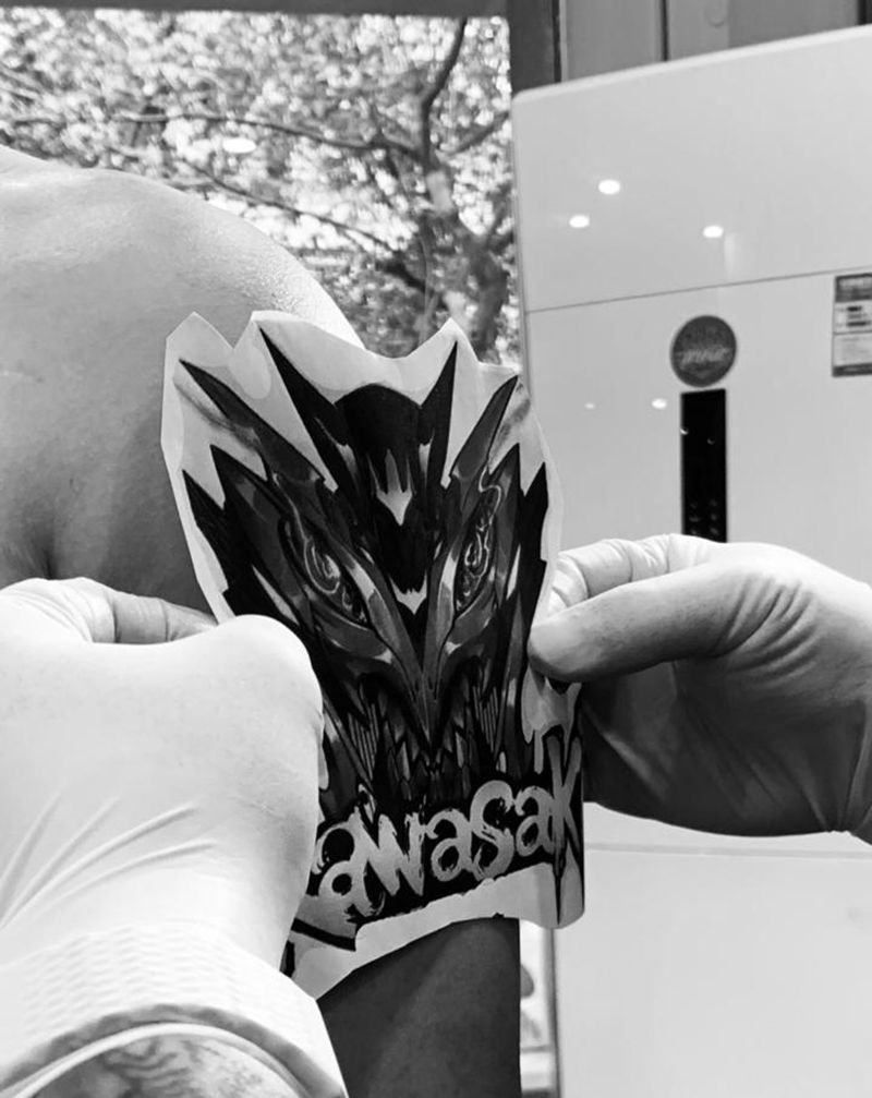 机车标志纹身图片_手臂纹身图案