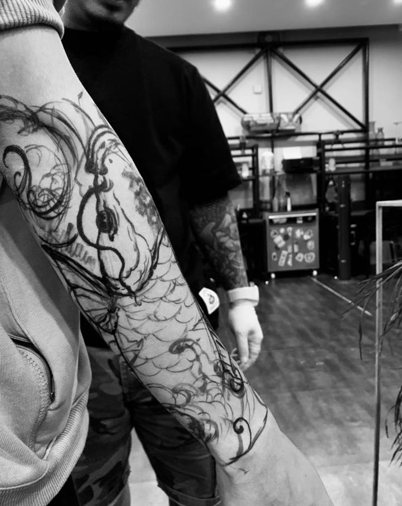 鲤鱼纹身图片_手臂纹身图案