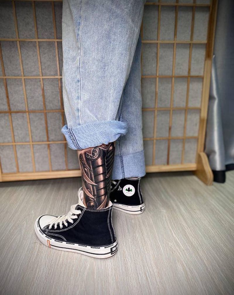 机械修改未完纹身图片_腿部纹身图案