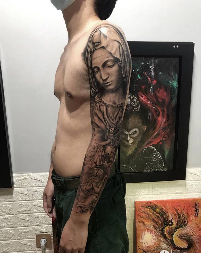 花臂待续纹身图片_手臂纹身图案