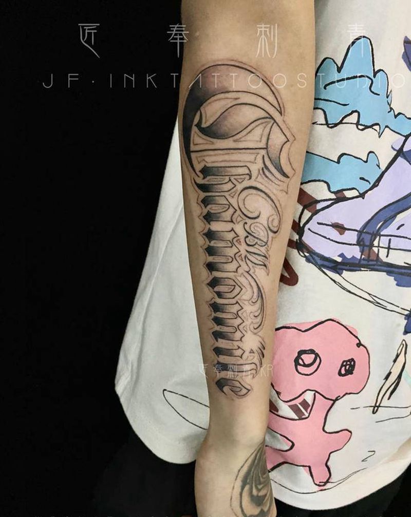 花体纹身图片_手臂花体字纹身图案