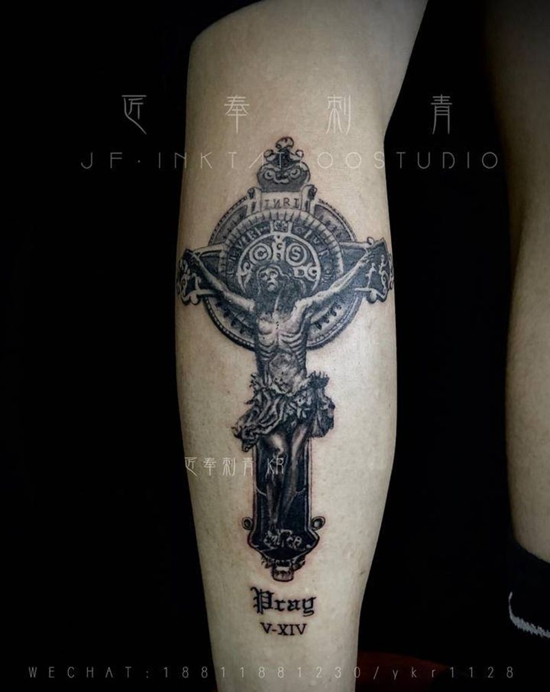 耶稣纹身图片_腿部欧美写实纹身图案