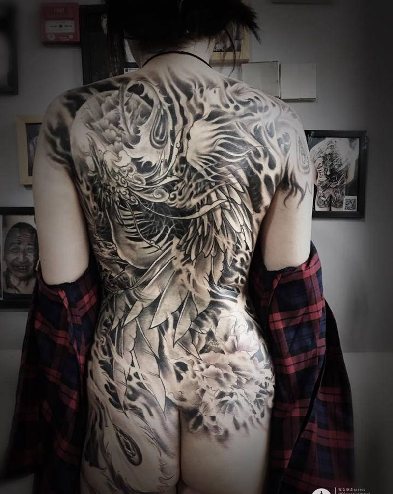 待续纹身图片_背部纹身图案