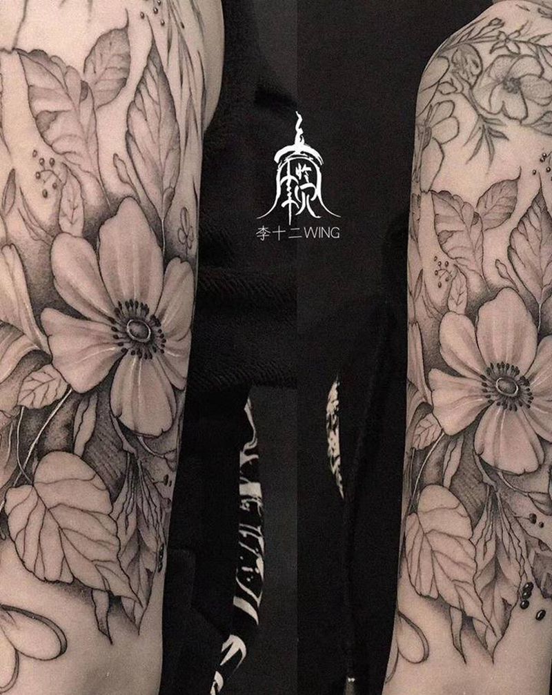 素花纹身图片_手臂水墨素花纹身图案