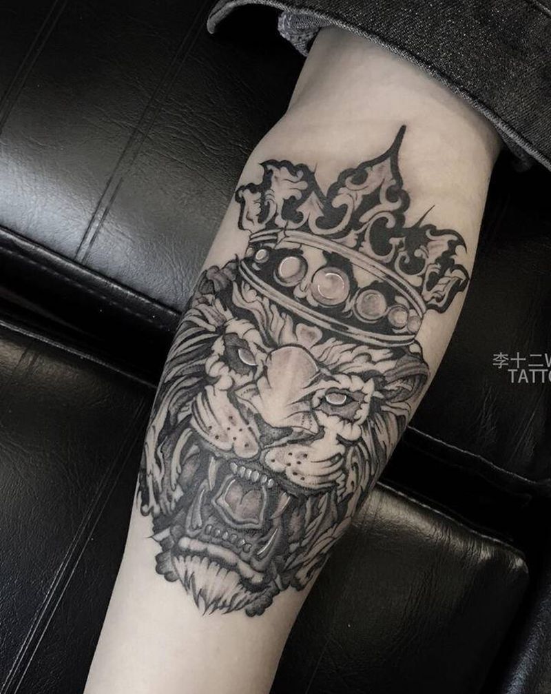 狮子纹身图片_手臂欧美写实图腾纹身图案