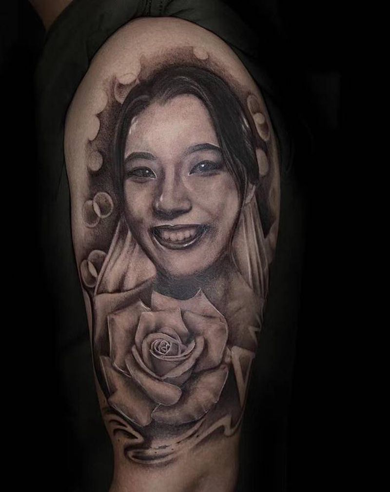 客人老婆的照片纹身图片_手臂欧美写实纹身图案