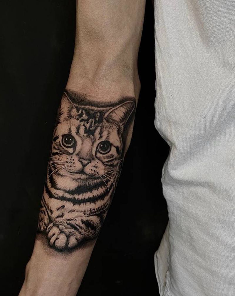 写实美短纹身图片_手臂欧美写实纹身图案