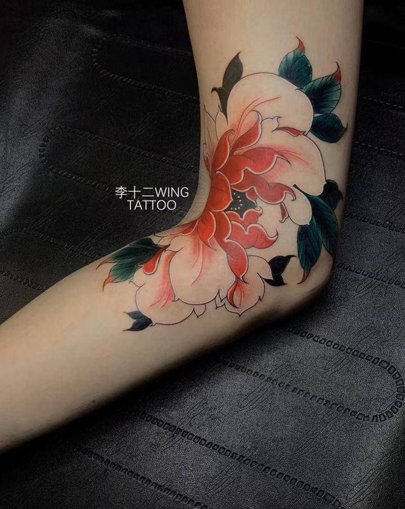 牡丹纹身图片_腿部老传统水彩纹身图案
