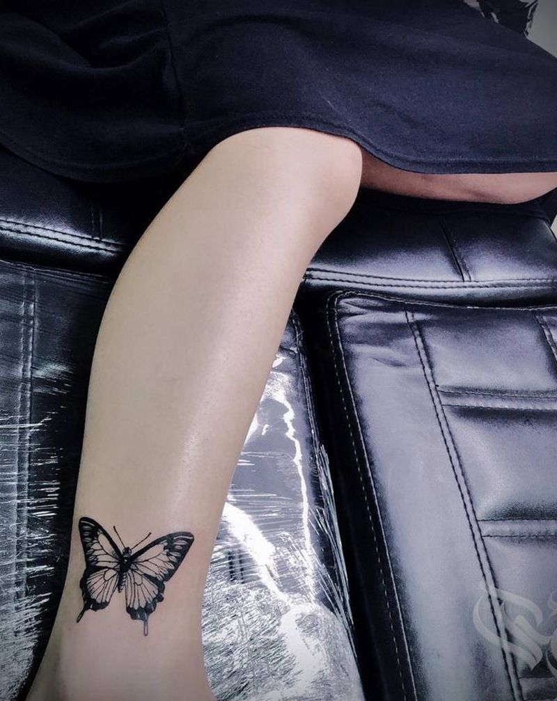 蝴蝶纹身图片_腿部点刺小清新纹身图案