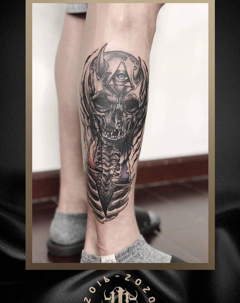 骷髅遮盖纹身图片_腿部纹身图案
