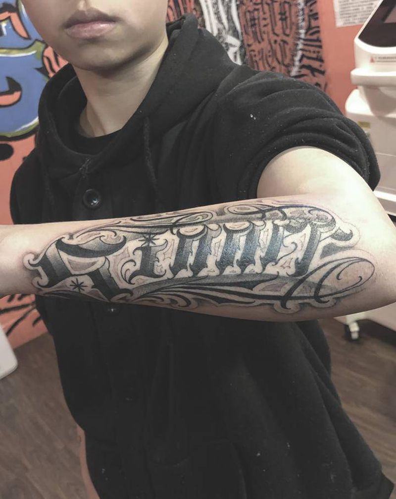 花体（罪人）纹身图片_花体字纹身图案