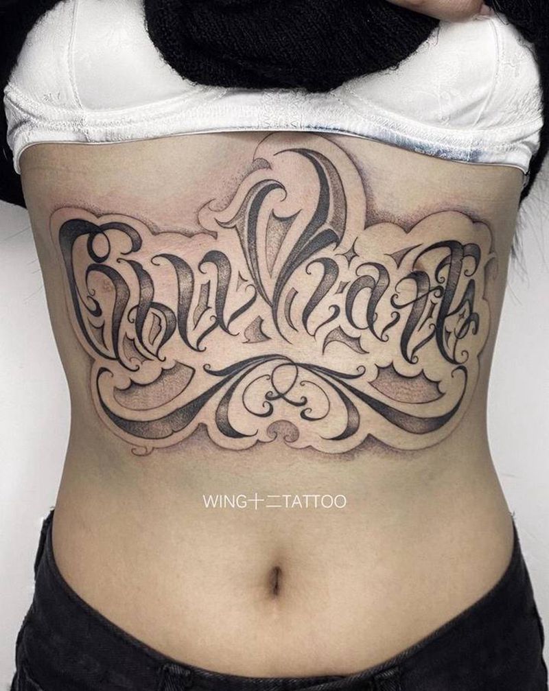 花体字遮盖纹身图片_腹部花体字纹身图案