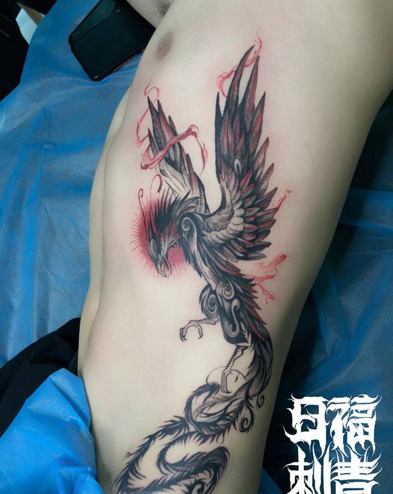 凤凰纹身纹身图片_腰部点刺新传统凤凰纹身图案