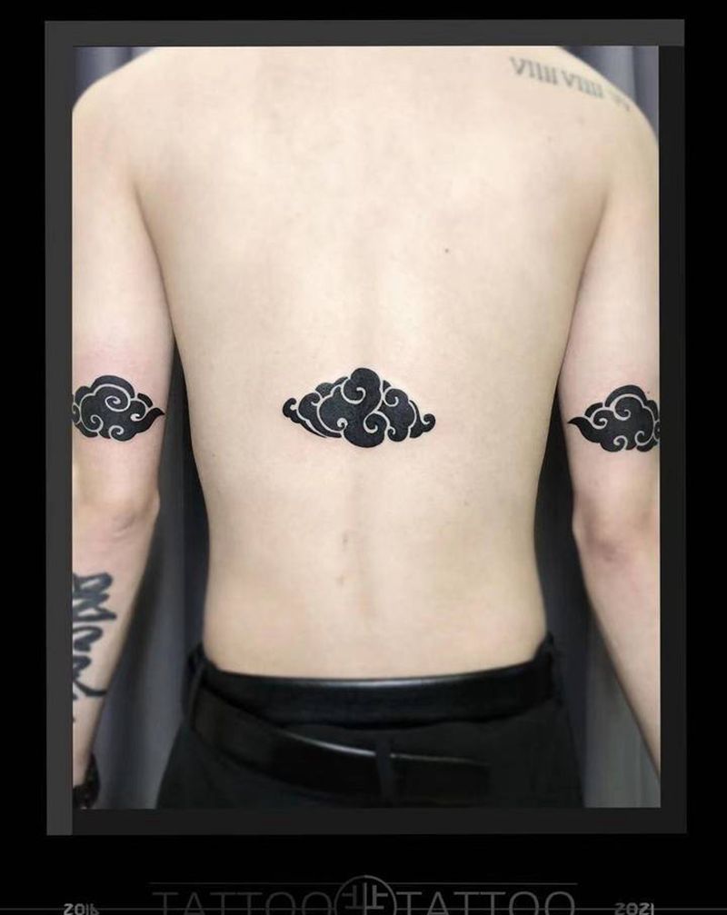 祥云纹身图片_手臂背部纹身图案