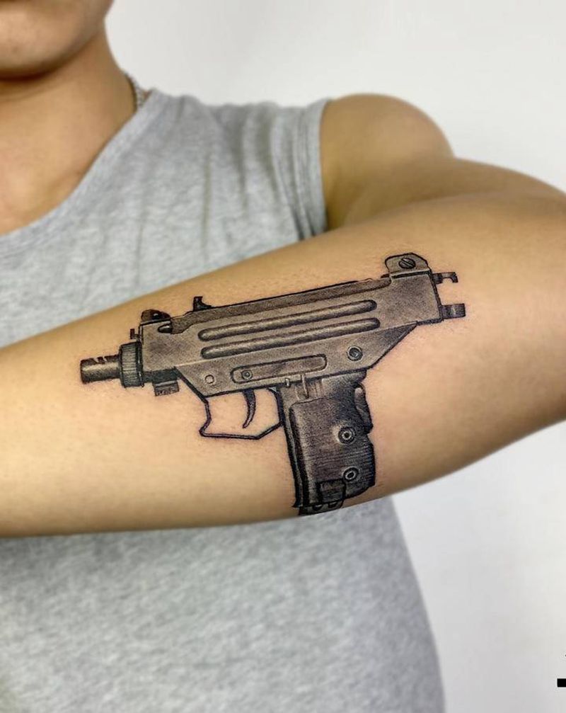 uzi纹身图片_手臂欧美写实纹身图案