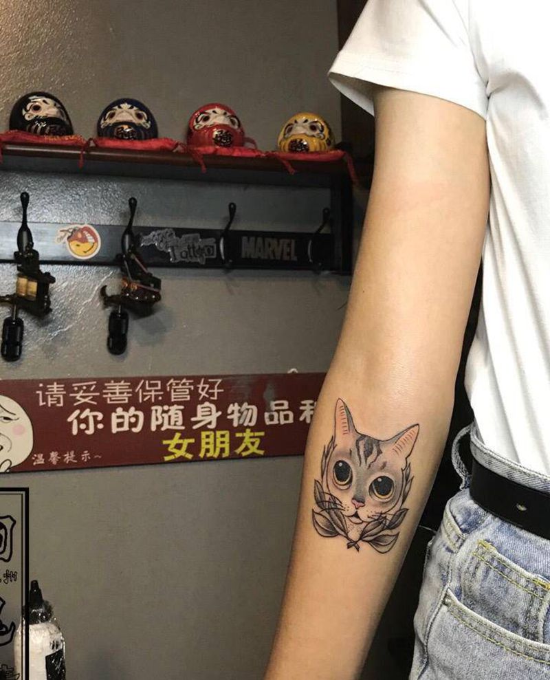 貓纹身图片_手臂纹身图案