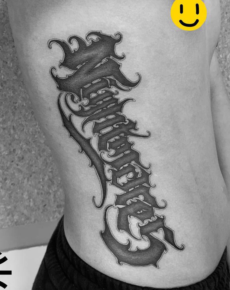 花体字纹身图片_腰部花体字纹身图案