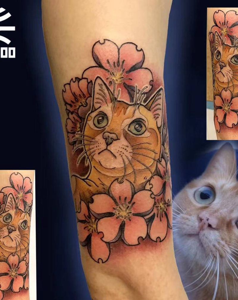 客人的猫纹身图片_手臂New School纹身图案