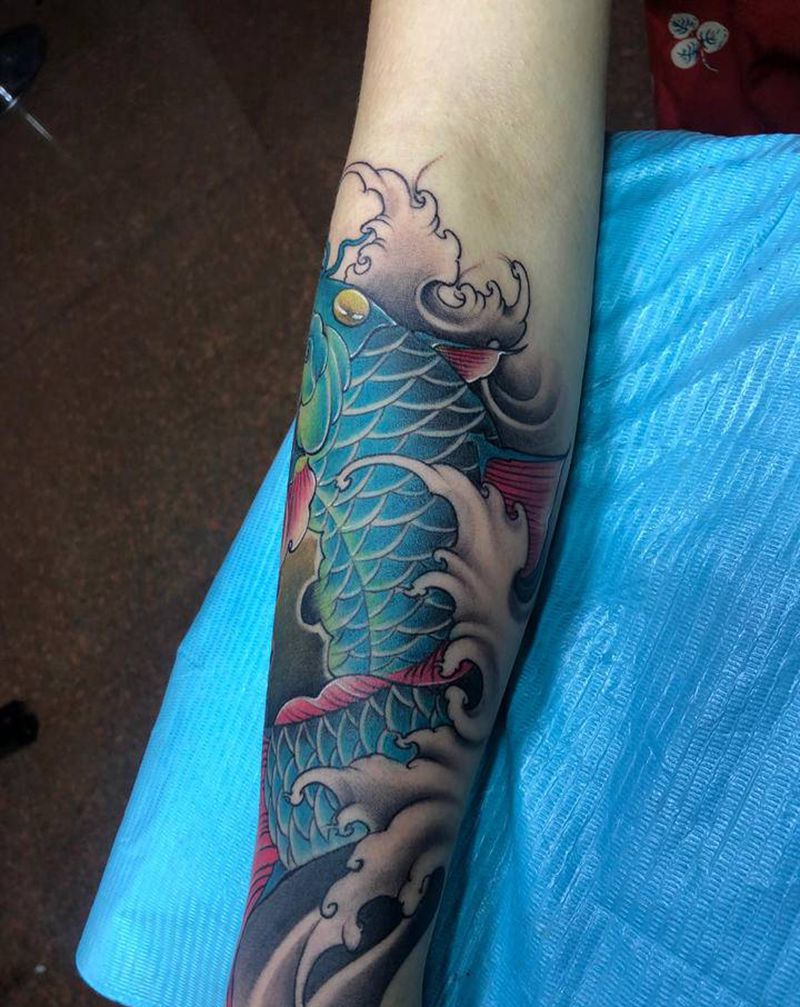 鱼纹身图片_手臂纹身图案