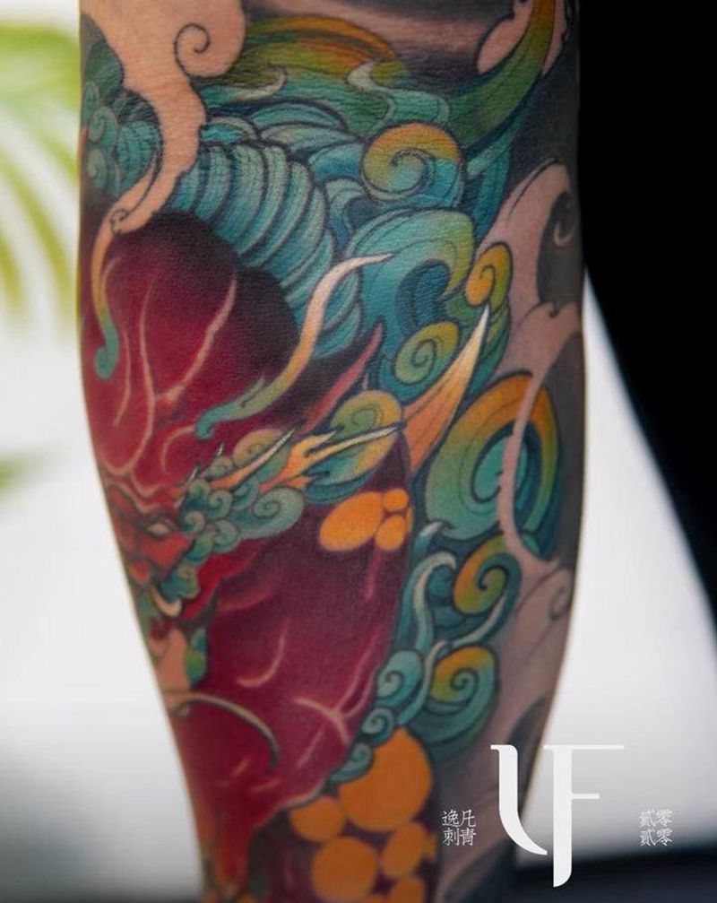 唐狮纹身图片_手臂新传统传统花臂唐狮纹身图案