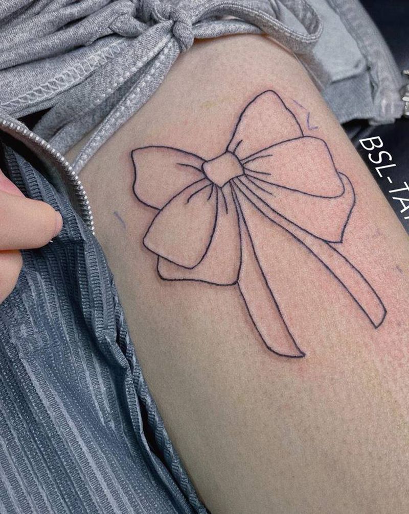 小清新：蝴蝶结纹身图片_腿部几何蝴蝶结纹身图案