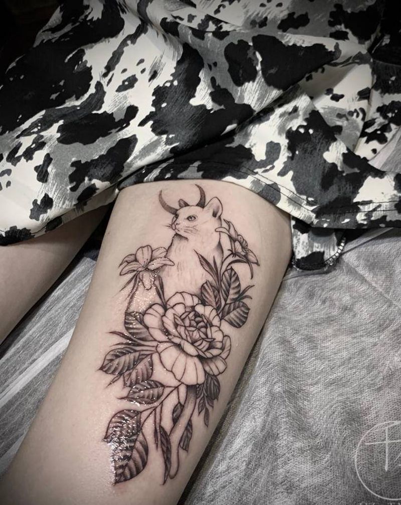 素花与猫的故事纹身图片_腿部纹身图案